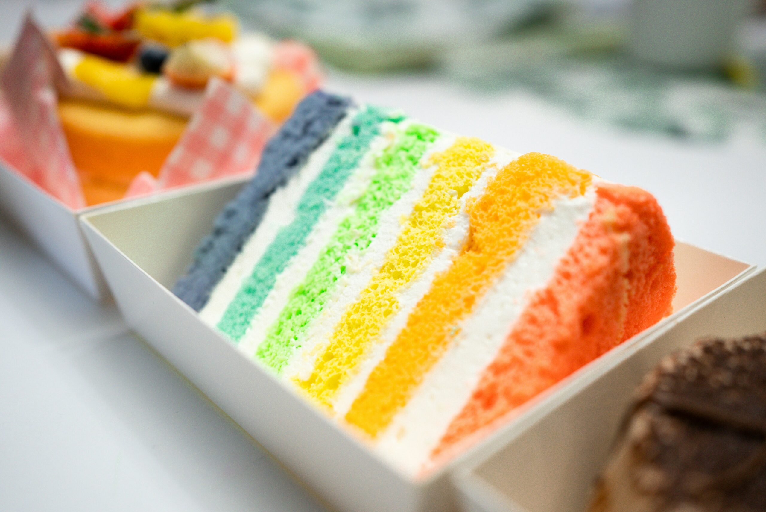 a close up of a slice of cake in a box